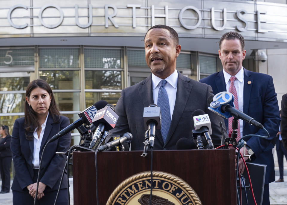 U.S. Attorney Breon Peace addresses journalists Thursday, Oct. 5, 2023, after the sentencing of Frank James, 64, who pleaded guilty earlier this year to terrorism charges in the April 12, 2022, mass shooting aboard a Manhattan-bound train. He received a life sentence on 10 counts and 10 years for an 11th count. Right center is FBI Special Agent in Charge Rob Kissane. (AP Photo/Craig Ruttle)