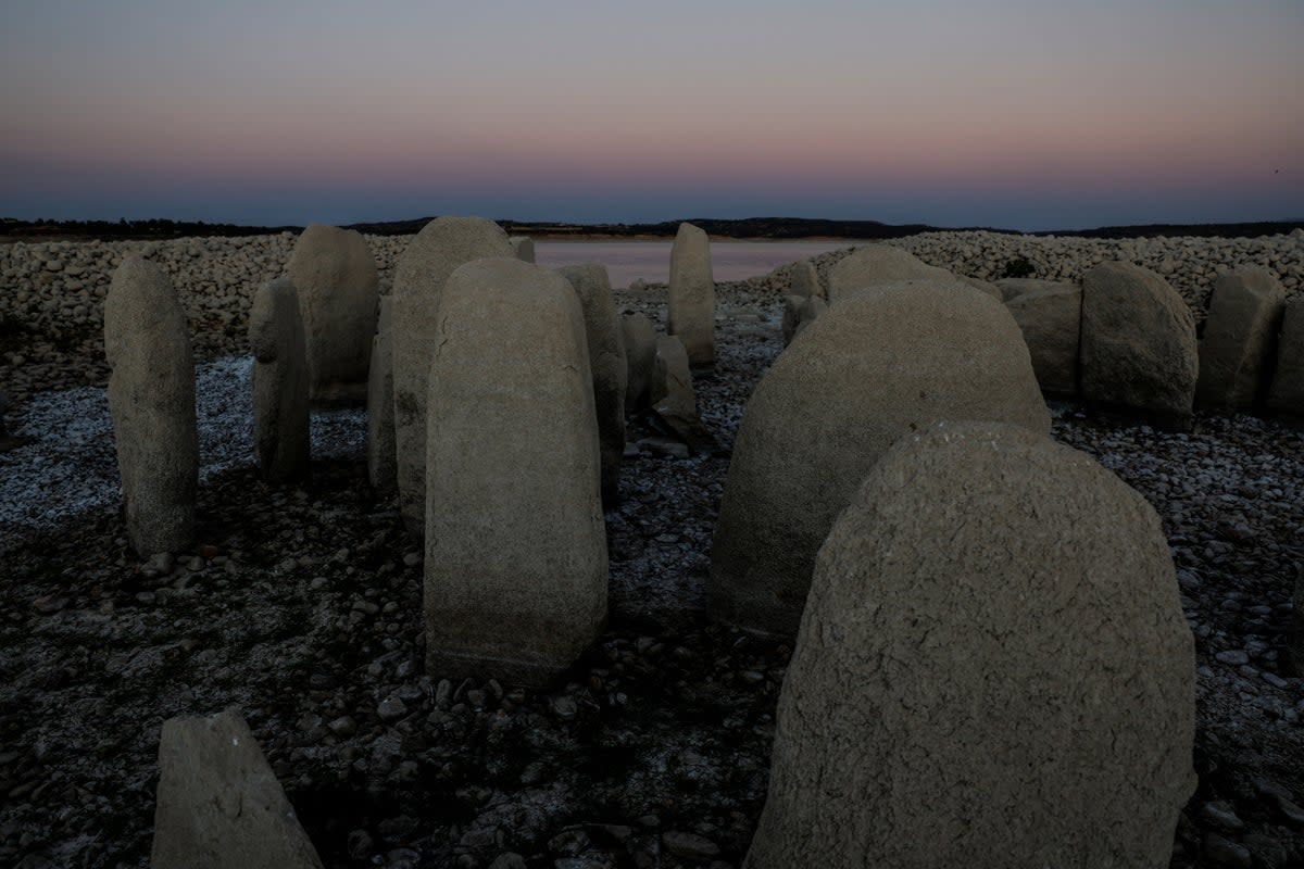 The dolmen of Guadalperal is seen due to the receding waters of the Valdecanas reservoir (REUTERS)