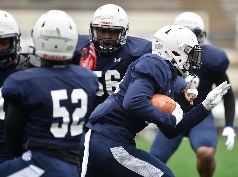 Jackson State University's Isaiah Bolden tries to get past defense during JSU's scrimmage game at Veterans Memorial Stadium in Jackson, Miss., Saturday, Feb. 13, 2021.