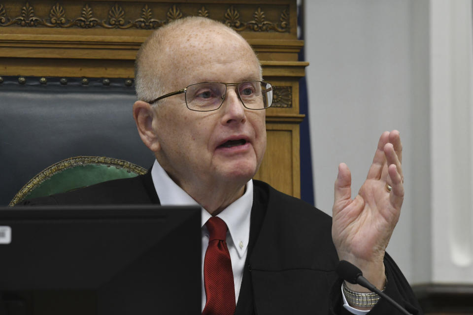 Judge Bruce Schroeder presides over a motion hearing, Tuesday, Oct. 5, 2021, in Kenosha, Wis., for Kyle Rittenhouse, who is accused of shooting three people during a protest against police brutality in Wisconsin last year. (Mark Hertzberg/Pool Photo via AP)