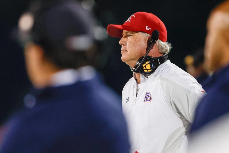 Providence Day head coach Chad Grier watches his team play against Rabun Gap in the first half in Charlotte, N.C., Friday, Oct. 20, 2023. (Nell Redmond photo)