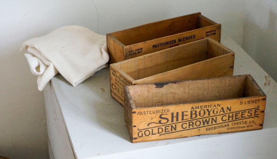 Cheese boxes and cheese cloth on display at the Julius Bodenstab Cheese Factory, Tuesday, September 26, 2023, on the campus of the Sheboygan County Historical Museum, in Sheboygan, Wis.