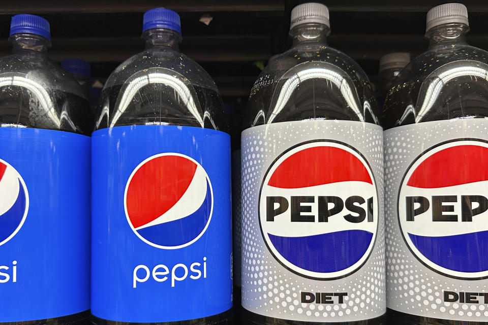 FILE - Plastic bottles of Pepsi are displayed at a grocery store in New York on Nov. 15, 2023. PepsiCo reported second quarter earnings results on Thursday, July 11, 2024. PepsiCo has leaned heavily into price increases over the past two years as its costs for ingredients and packaging rose. The fourth quarter of 2023 was the company’s eighth straight quarter of double-digit percentage price increases. (AP Photo/Ted Shaffrey, File)