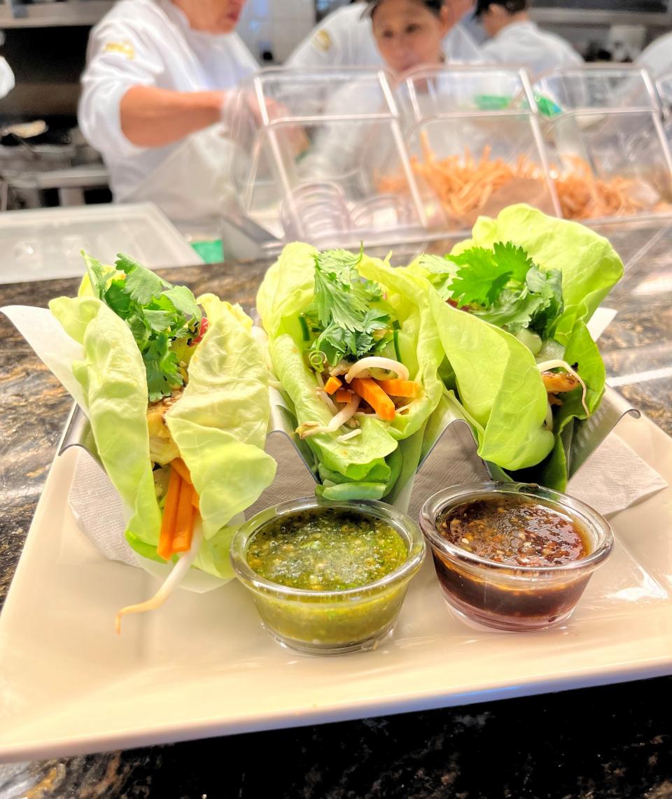 Asian chicken lettuce wrap tacos are on the menu at The Cheesecake Factory.