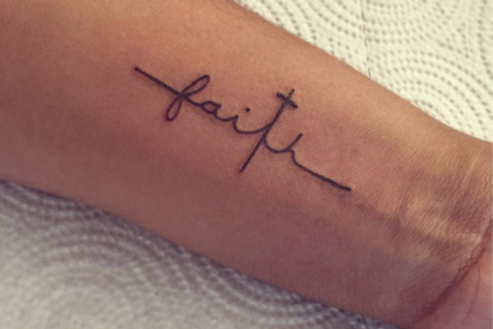 Dainty script "faith" cross tattoo <p>Chris Rayford</p>