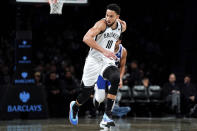 Brooklyn Nets guard Ben Simmons follows the ball during the first half of a preseason NBA basketball game against the Philadelphia 76ers, Monday, Oct. 3, 2022, in New York. (AP Photo/Julia Nikhinson)