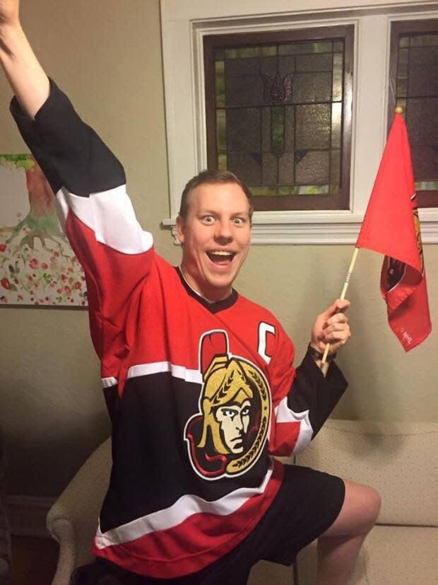 ​James Mellish, an Ottawa Senators fan, couldn't believe his ears when the parody song he recorded for the nascent Sens Sicko movement was played at a home game at the Canadian Tire Centre.  (Submitted/James Mellish - image credit)