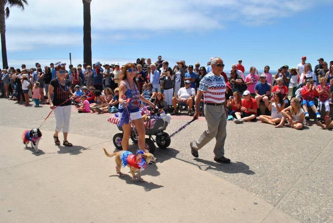 Dogs and their owners will participate in the Avila Beach Doggie Parade on July 4, 2022.