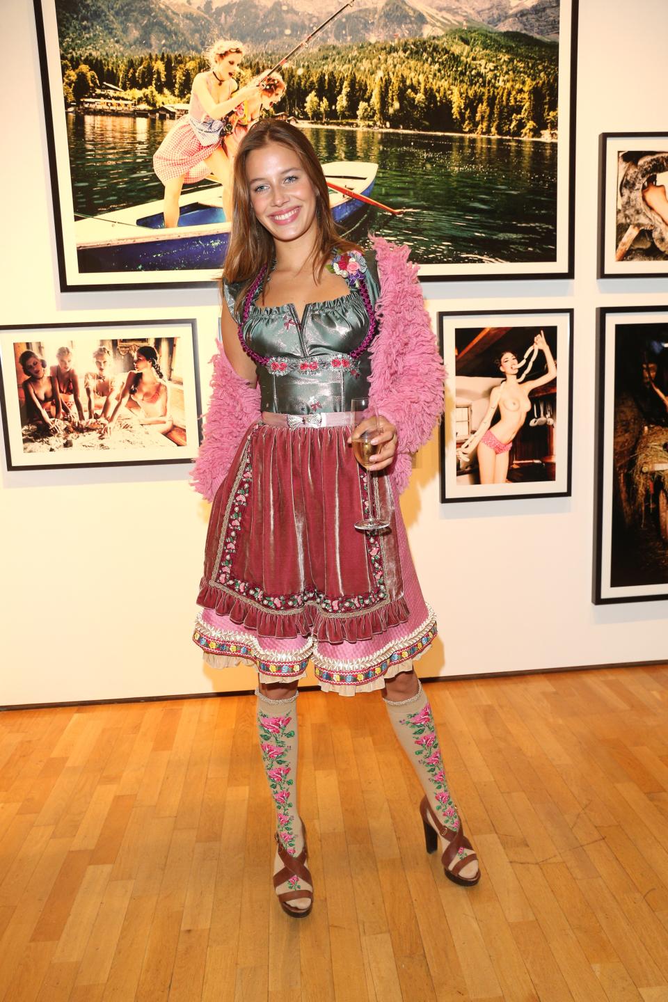 MUNICH, GERMANY - SEPTEMBER 14: Model Nicole Poturalski wearing a dirndl by Lola Paltinger during the 'Ellen von Unwerth: HEIMAT' Exhibition Opening at Immagis Fine Art Photography gallery on September 14, 2017 in Munich, Germany. (Photo by Gisela Schober/Getty Images)