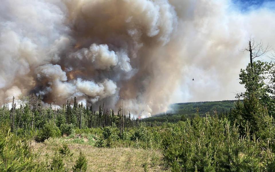 Smoke from the West Kiskatinaw River and Peavine Creek wildfires in the Dawson Creek Zone, British Colombia, Canada - AFP