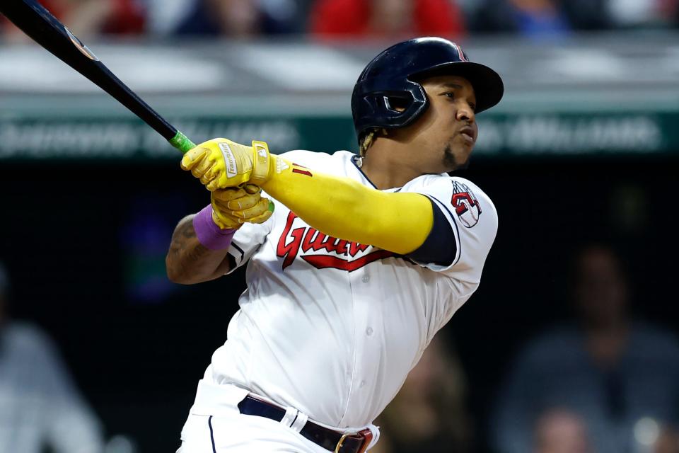 Cleveland goaltenders' Jose Ramirez watches his solo home run against Houston Astros relief pitcher Rafael Montero in the seventh inning of a baseball game, Friday, June 9, 2023, in Cleveland.  (AP Photo/Ron Schwane)