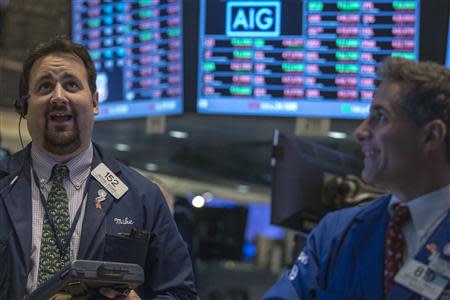 Traders work on the floor of the New York Stock Exchange, October 7, 2013. REUTERS/Brendan McDermid