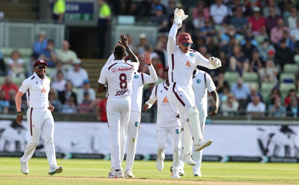 Alzarri Joseph of the West Indies celebrates with team mate Joshua Da Silva after taking the wicket of Ben Duckett during day one of the 3rd Test Match between England and the West Indies at Edgbaston on July 26, 2024 in Birmingham, England