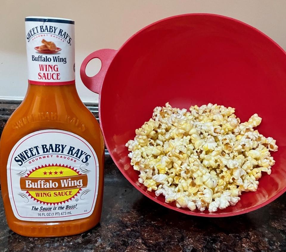 Popcorn and buffalo sauce