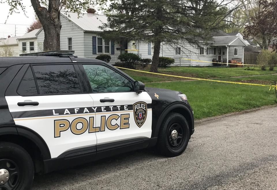 Lafayette police stand watch outside of 714 Park Ave. on Tuesday, April 20, 2021. Officers found a missing 9-year-old girl inside the house on Monday, April 19, 2021. The girl had been battered and bit by the resident's dog. The man who lived here, James Brian Chadwell, 42, was arrested.