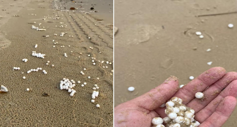 polystyrene balls washed up on sand at Queensland beach. 