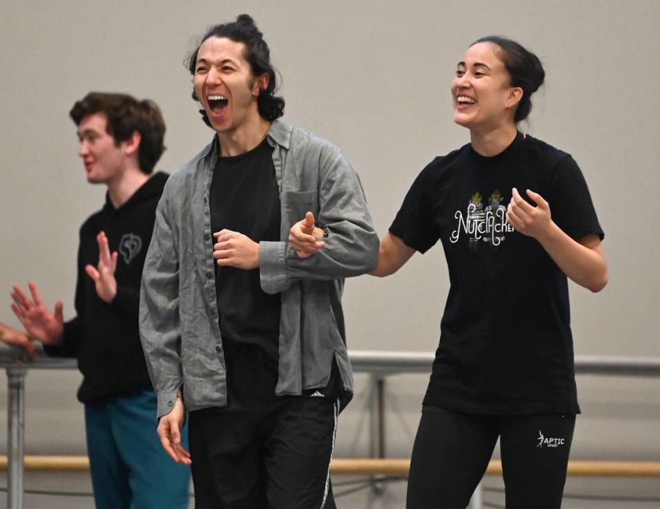 Remi Okamoto, right, laughs during a Charlotte Ballet rehearsal for “Nutcracker.” “I think, as a dancer, daily life, daily routines make a stable life.”