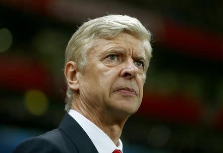 Arsenal manager Arsene Wenger reacts during their Champions League group D soccer match against Borussia Dortmund in London November 26, 2014. REUTERS/Eddie Keogh