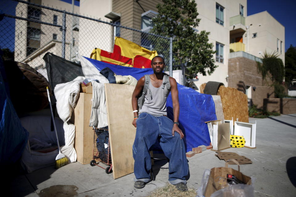 Dontray Williams by the tent&nbsp;he lives in on the streets of Los Angeles. He has been periodically homeless for five years and is hoping to find a job and an apartment. (Photo: Lucy Nicholson/Reuters)