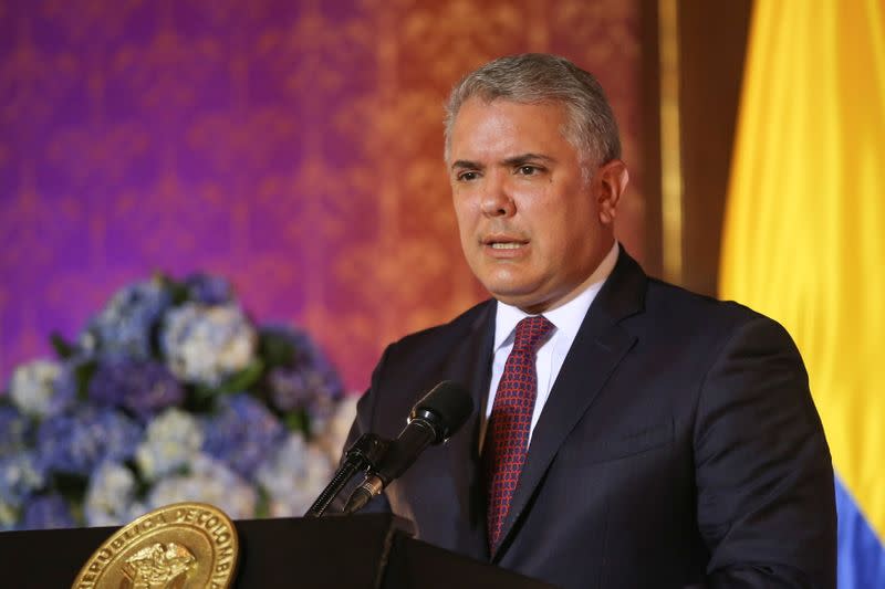 El presidente de Colombia, Iván Duque, habla durante el anuncio del otorgamiento del estatus legal de protección temporal a los migrantes venezolanos, en Bogotá