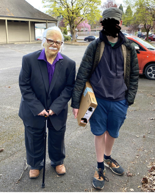 A woman dressed like an old man