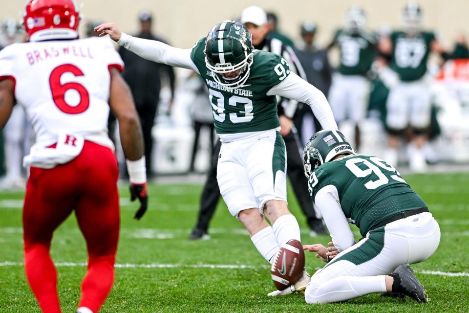 Michigan State's Ben Patton, center, makes a field goal against Rutgers during the fourth quarter on Saturday, Nov. 12, 2022, in East Lansing.