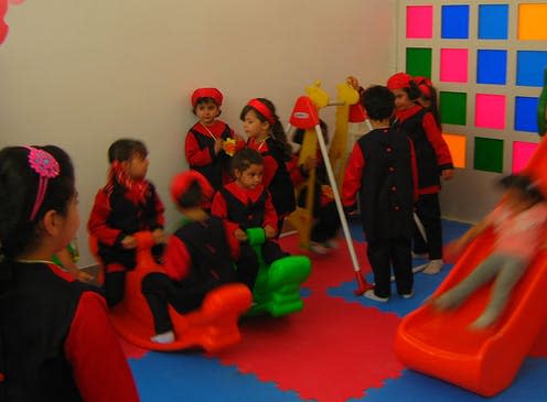 <span class="caption">Give me the child: Iranian children on their first day at kindergarten.</span> <span class="attribution"><span class="source">Sonia Sevilla via Wikimedia Commons</span>, <a class="link " href="http://creativecommons.org/licenses/by-sa/4.0/" rel="nofollow noopener" target="_blank" data-ylk="slk:CC BY-SA;elm:context_link;itc:0;sec:content-canvas">CC BY-SA</a></span>