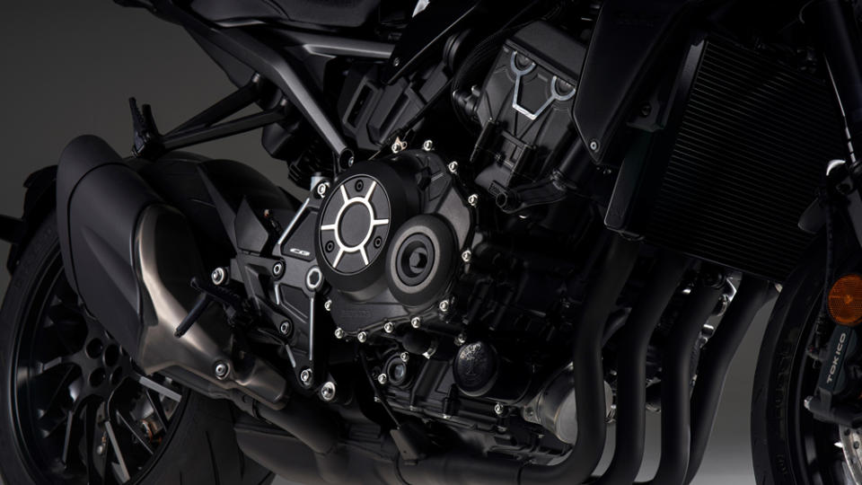 A close-up of the 998 cc inline-four motor on the 2022 Honda CB1000R Black Edition motorcycle.
