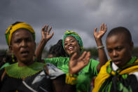 Supporters of Ukhonto weSizwe party dance during an election meeting in Mpumalanga, near Durban, South Africa, Saturday, May 25, 2024, ahead of the 2024 general elections scheduled for May 29. (AP Photo/Emilio Morenatti)