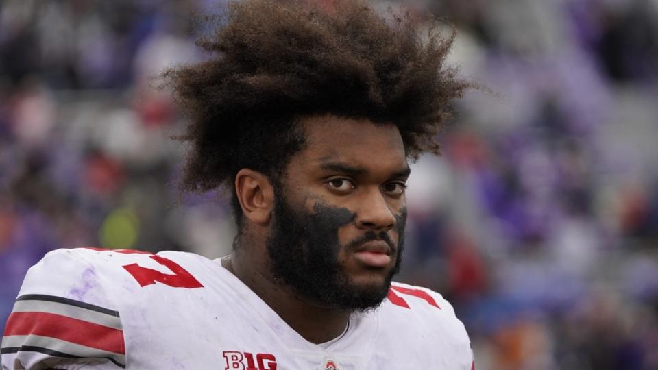 Nov 5, 2022; Evanston, Illinois, USA; Ohio State Buckeyes offensive lineman Paris Johnson Jr. (77) headshot during the second half at Ryan Field