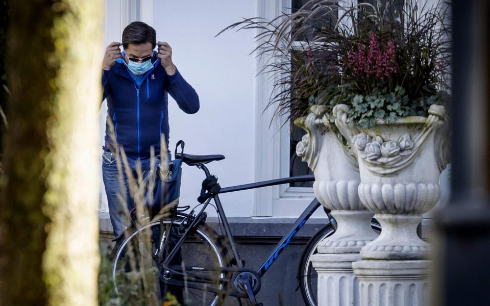 Prime Minister Mark Rutte arrives for an informal meeting on the novel coronavirus, Covid-19, at the Catshuis in The Hague - ROBIN VAN LONKHUIJSEN /AFP