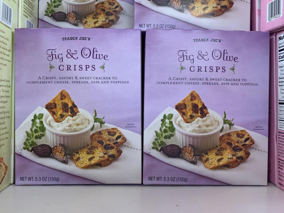 purple boxes of fig and olive crisps from trader joe's