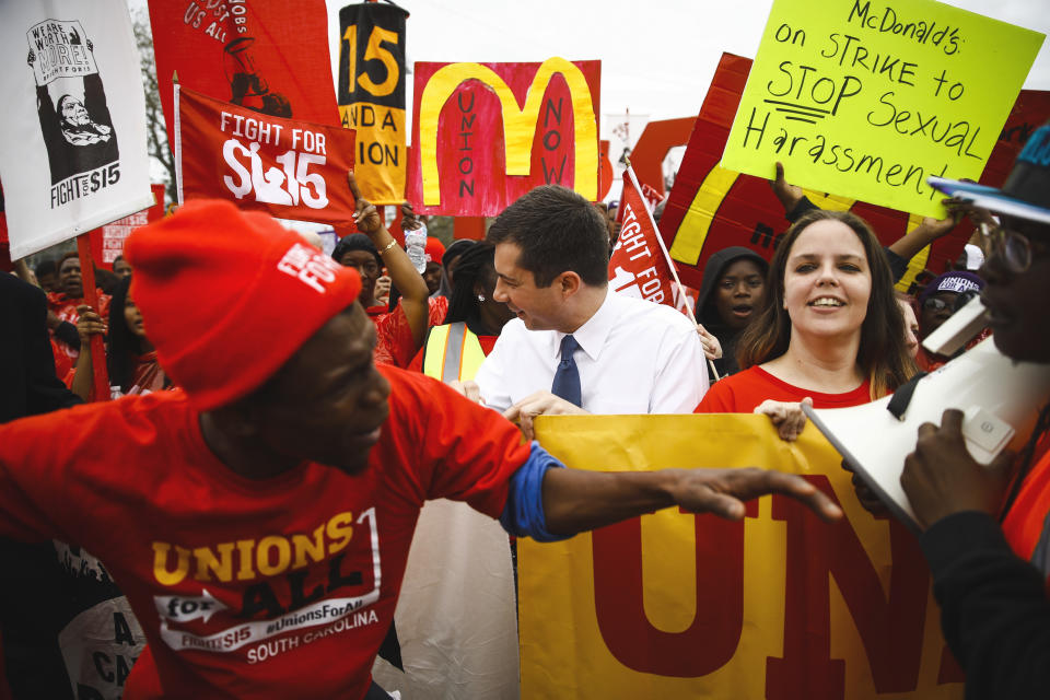 Democratic presidential candidate former South Bend, Ind., Mayor Pete Buttigieg joins demonstrators calling for a union and $15 minimum wage at McDonald's, Monday, Feb. 24, 2020, in Charleston, S.C. (AP Photo/Matt Rourke)