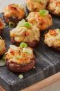 <p>Everyone loves a good <a href="https://www.delish.com/uk/cooking/recipes/a29707397/easy-stuffed-mushroom-recipe/" rel="nofollow noopener" target="_blank" data-ylk="slk:stuffed mushroom;elm:context_link;itc:0" class="link ">stuffed mushroom</a>. In fact, we'd venture to say it's one of the world's best party snacks. They're easy to make and reheat, perfectly bite-sized, and ridiculously delicious. This version is even MORE irresistible with the addition of sweet, tender crab, fresh spring onions, and rich cream cheese.</p><p>Get the <a href="http://www.delish.com/uk/cooking/recipes/a32978049/crab-artichoke-stuffed-mushrooms-recipe/" rel="nofollow noopener" target="_blank" data-ylk="slk:Crab Stuffed Mushrooms;elm:context_link;itc:0" class="link ">Crab Stuffed Mushrooms</a> recipe.</p>