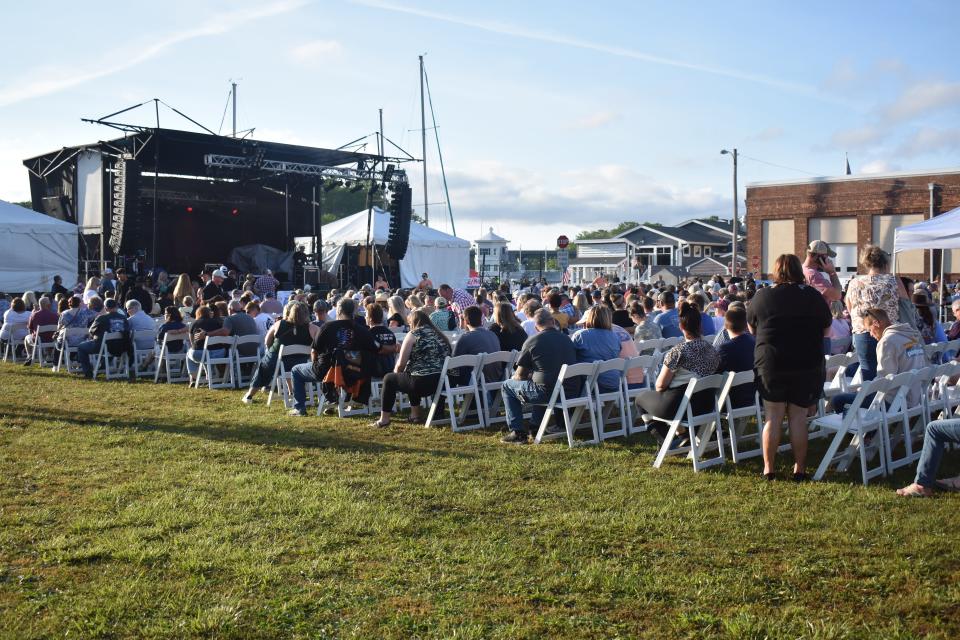 A crowd gathers at Dockside’s inaugural “Dock Jam” on Saturday, May 20, 2023, in Pocomoke City, Maryland.