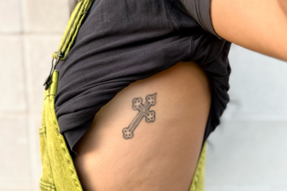 Subtly intricate cross tattoo <p>Anna Wexler</p>