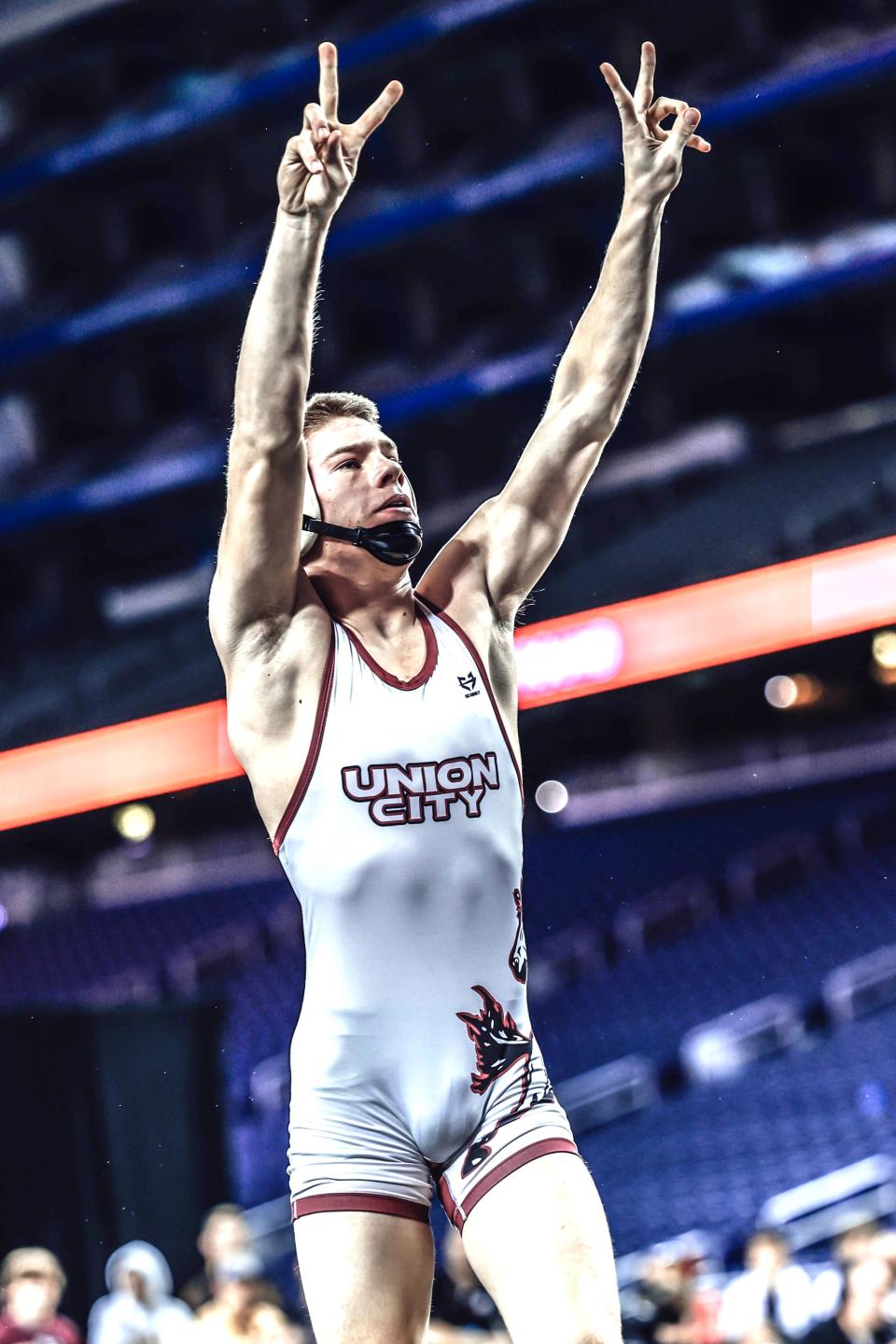 Union City junior Landyn Crance flashes the number two after winning his second straight state title at Ford Field. Crance brought home the title at 132 pounds after winning the 125 pound title last year