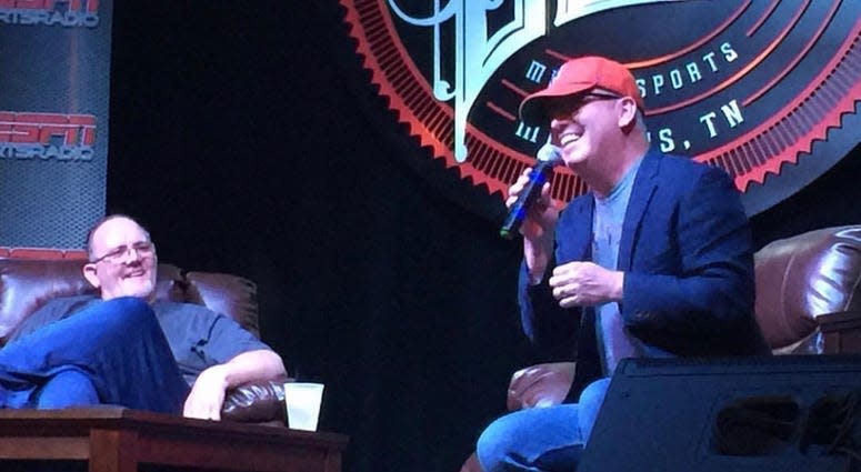 Keith Easterwood (left) and 92.9 FM ESPN radio host Gary Parrish telling stories on stage at an event in 2019.