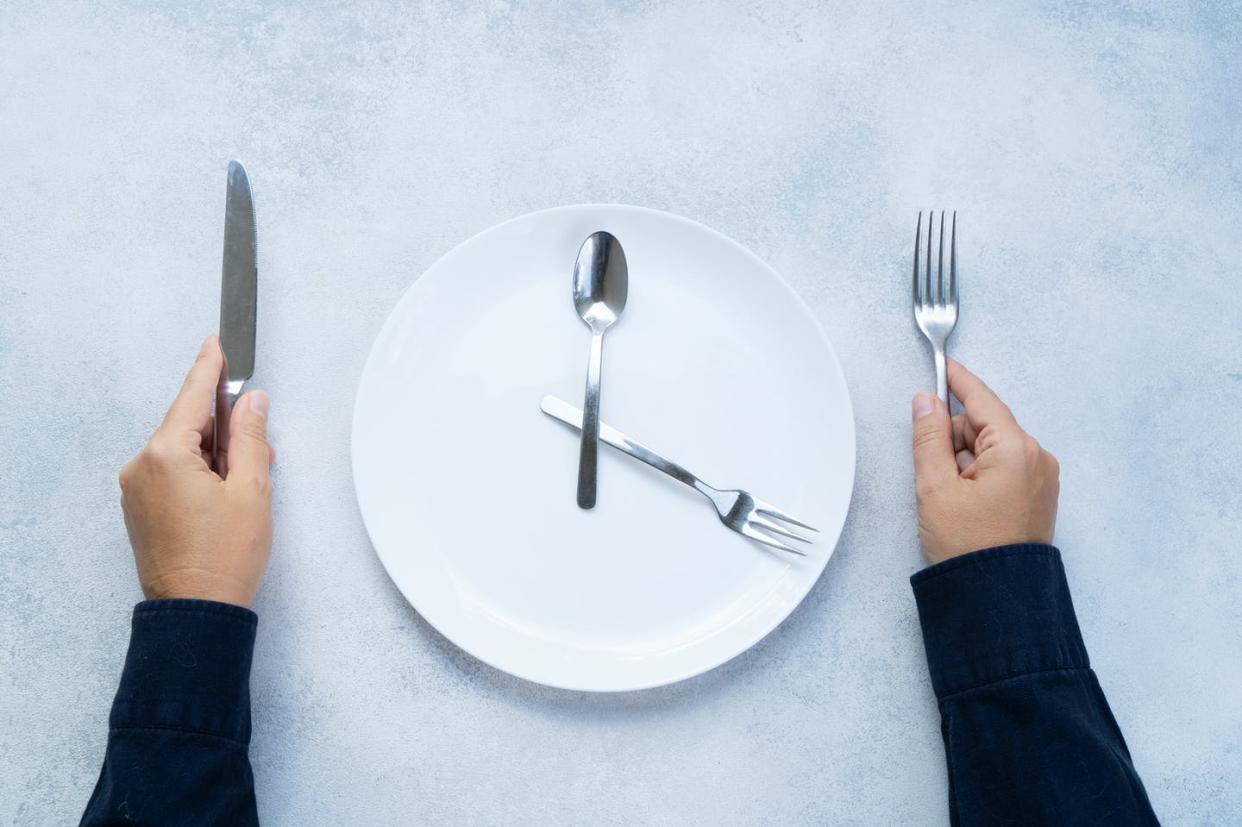 <span class="caption">Intermittent fasting could have an array of health benefits, but as of yet there are no long-term studies into its effects.</span> <span class="attribution"><a class="link " href="https://www.gettyimages.com/detail/photo/intermitted-farsting-diet-concept-royalty-free-image/1361961784?adppopup=true" rel="nofollow noopener" target="_blank" data-ylk="slk:neirfy/iStock via Getty Images Plus;elm:context_link;itc:0;sec:content-canvas">neirfy/iStock via Getty Images Plus</a></span>