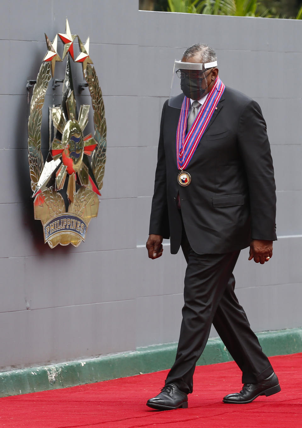 United States Defense Secretary Lloyd Austin arrives at Camp Aguinaldo military camp in Quezon City, Metro Manila, Philippines Friday, July 30, 2021. Austin is visiting Manila to hold talks with Philippine officials to boost defense ties and possibly discuss the The Visiting Forces Agreement between the US and Philippines. (Rolex dela Pena/Pool Photo via AP)