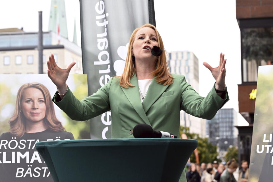Annie Loof, leader of the Center Party, campaigns at Sergels torg in Stockholm, Saturday, Sept. 10, 2022. Sweden is holding an election on Sunday to elect lawmakers to the 349-seat Riksdag as well as to local offices across the nation of 10 million people. (Jonas Ekstromer/TT News Agency via AP)