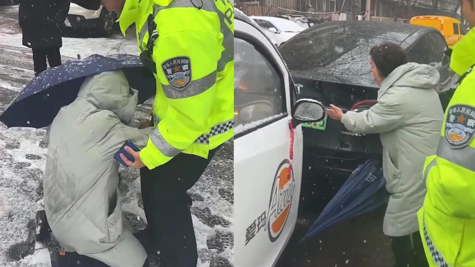 <strong>看完行車紀錄器，大媽「反轉」抱警大腿哭求饒。（圖／翻攝星視頻）</strong>