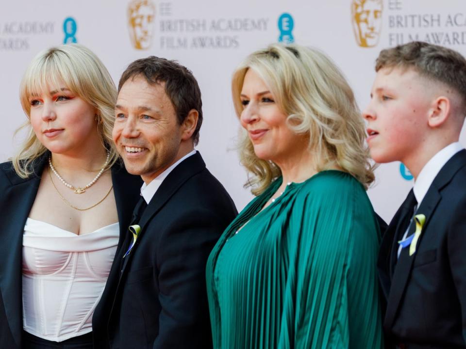 Graham with his children and his wife, actor Hannah Walters (Getty)