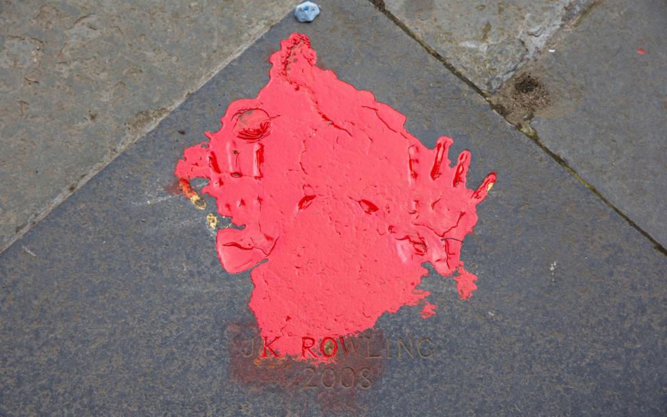 Hand prints with red paint - Duncan McGlynn