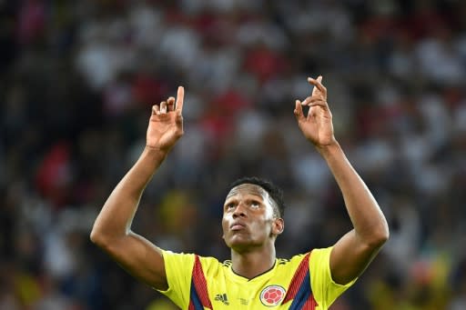 Colombia defender Yerry Mina celebrates after scoring the equalising goal against England in the World Cup last-16 in Moscow