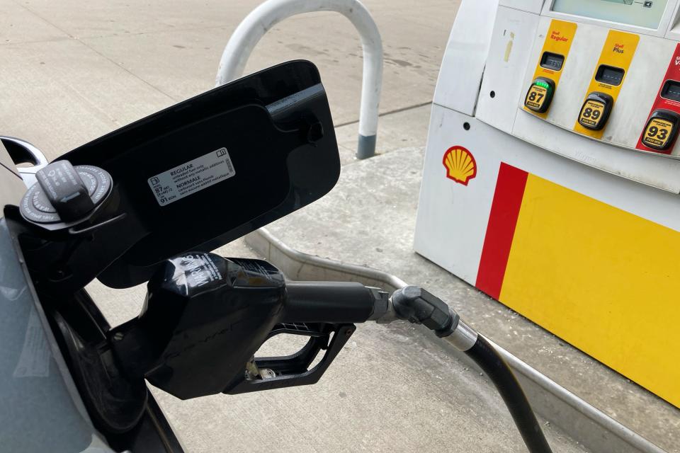 File - Fuel is pumped into a vehicle at a gas station in Mundelein, Ill., Tuesday, Feb. 14, 2023. On Wednesday, the Labor Department reports on U.S. consumer prices for March. (AP Photo/Nam Y. Huh, File)