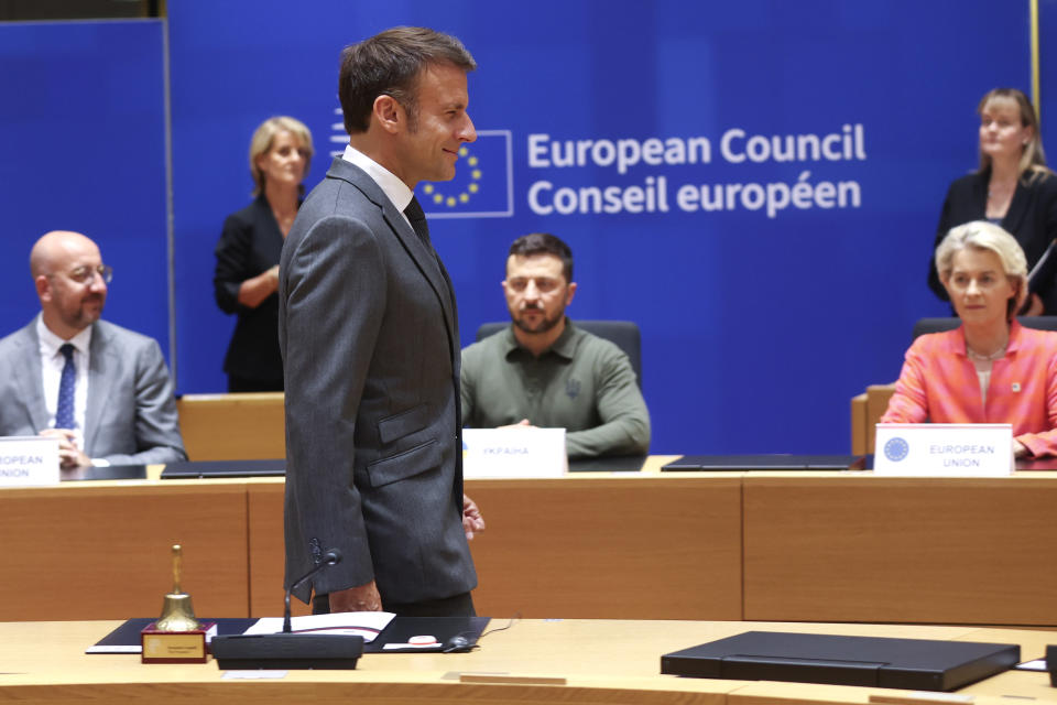 French President Emmanuel Macron, center, arrives for a round table meeting during an EU summit in Brussels, Thursday, June 27, 2024. European Union leaders are expected on Thursday to discuss the next EU top jobs, as well as the situation in the Middle East and Ukraine, security and defence and EU competitiveness. From left, European Council President Charles Michel, Ukraine's President Volodymyr Zelenskyy and European Commission President Ursula von der Leyen. (Olivier Hoslet, Pool Photo via AP)