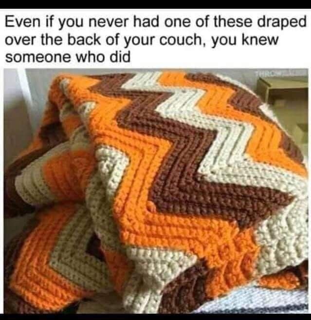 Old orange-and-brown zigzag-pattern blanket