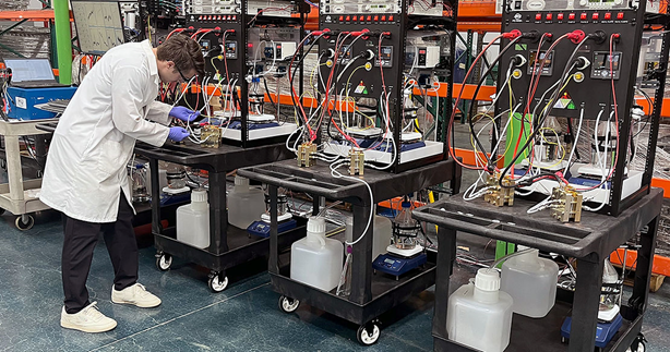 Photo: Dr. Zachary Ifkovits, Electrochemical Test Engineer, evaluates low-cost iridium alternatives on one of the 20-plus catalyst test stations at H2U's facility in Chatsworth, CA<br>