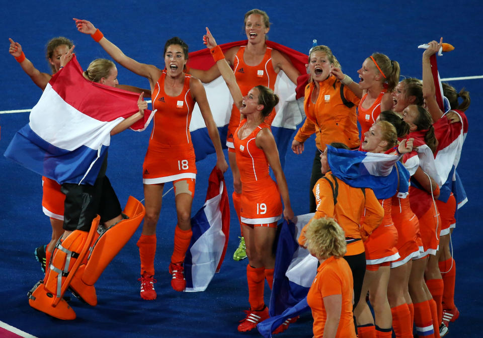 Team Netherlands celebrate their 2-0 victory over team Argentina after the Women's Hockey gold medal match on Day 14 of the London 2012 Olympic Games at Hockey Centre on August 10, 2012 in London, England. (Getty Images)